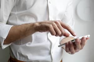 searching on his phone